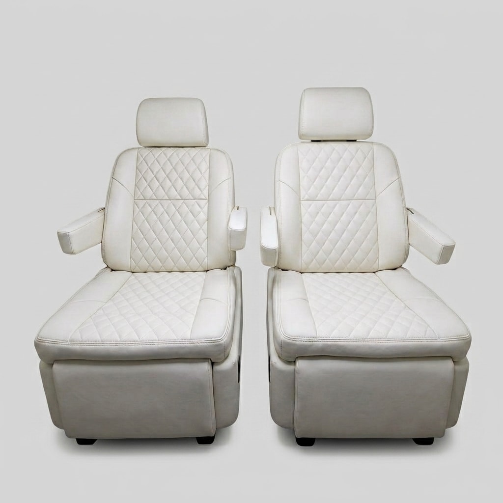 Premium business-inspired fully adjustable comfort seating in cream — two quilted ivory leather captain's chairs with diamond stitching, integrated headrests, and padded armrests